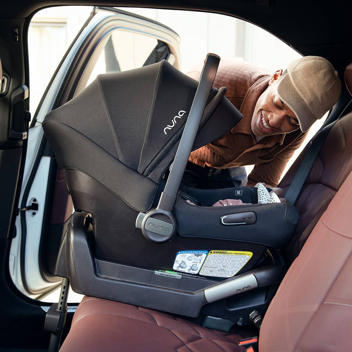 Child car seat professionally installed in a Lux4Rides luxury SUV before an LAX pickup