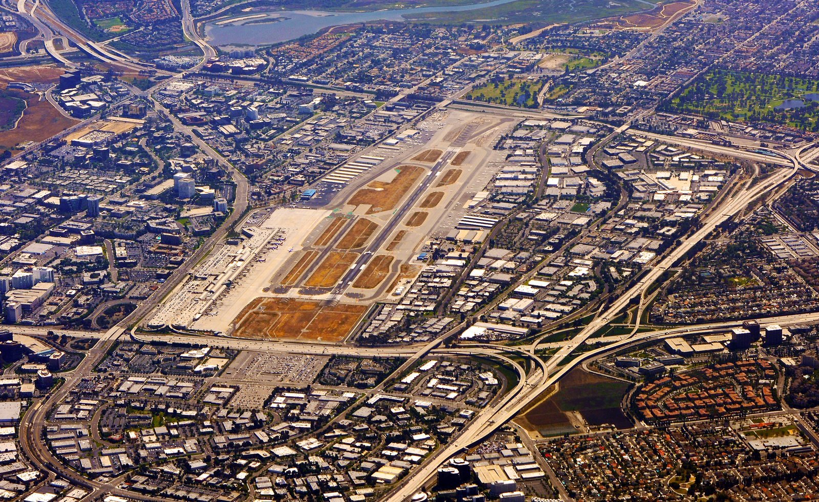 Aerial view of John Wayne Airport and the surrounding Orange County freeways