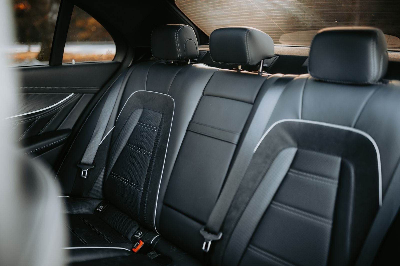 Black leather cabin of a Lux4Rides vehicle for a night out in Los Angeles