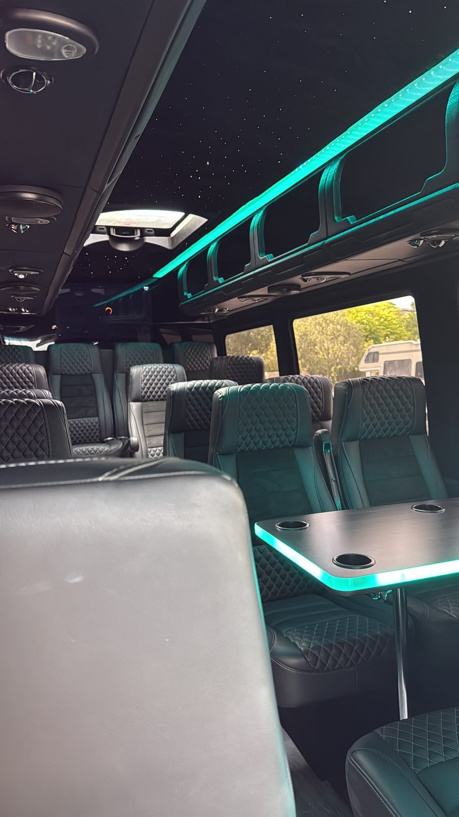 Executive 3 Mercedes Sprinter, Los Angeles — interior daylight teal table