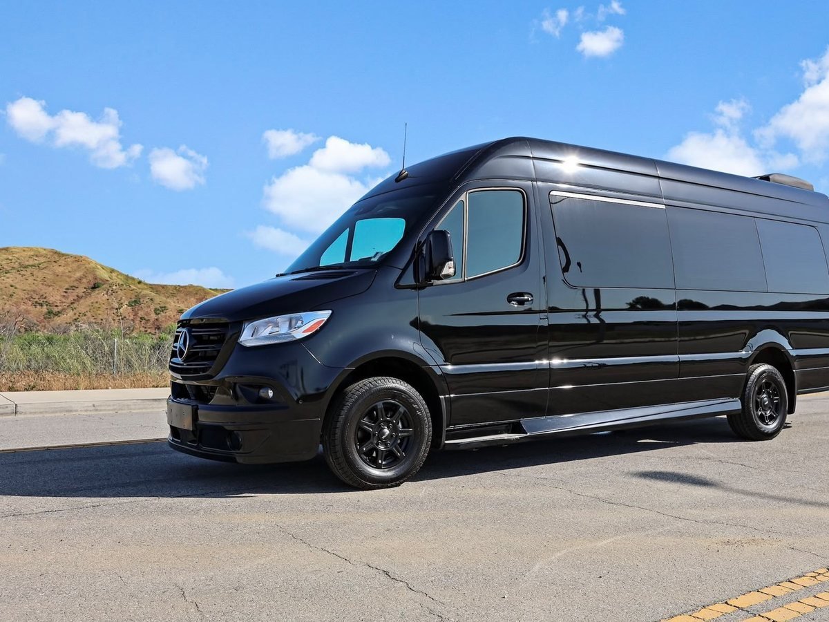 Jet Sprinter, Los Angeles — black Mercedes-Benz Sprinter, front three-quarter view