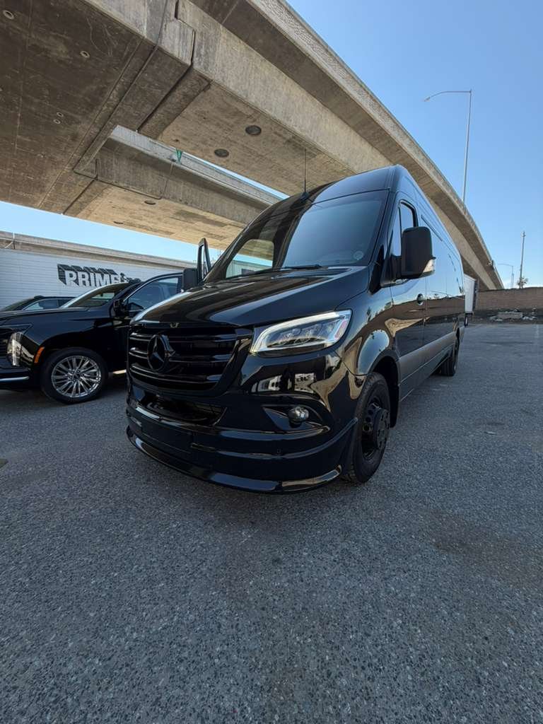 Lux 10+1 VIP Mercedes Sprinter exterior front view - luxury 11 passenger Sprinter rental Los Angeles